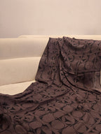bamboo modal scarf light weight summer woven hijab in brown neutral chic patternflat lay on a sofa
